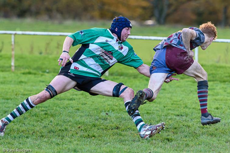 Benji Kirk pulls off a great tackle. Pictures by Paul Rodgers